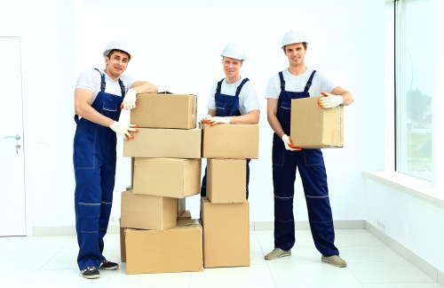 Professional movers handling furniture in Canonbury