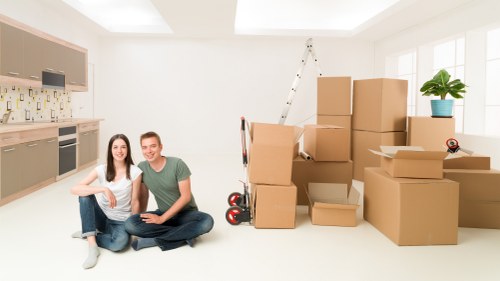 Packed boxes and furniture prepared for mobile storage collection