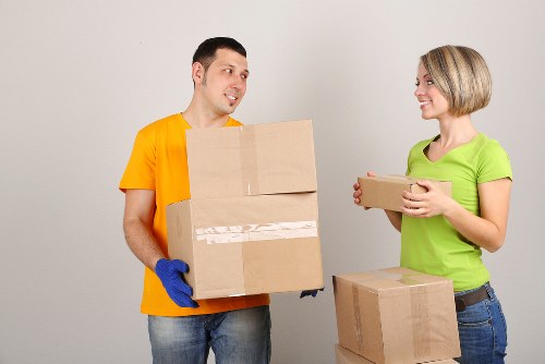 Staff following safety procedures in a storage environment